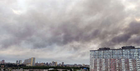 Kyiv, Ukraine June 5, 2022: Black smoke over buildings and quarters after rocket attacks on the city of Kyivのeditorial素材