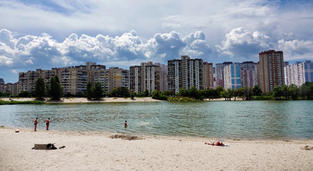 Kiev, Ukraine June 13, 2021: buildings and quarters of the Ukrainian capital city of Kiev near the lake and the Dnieper riverのeditorial素材