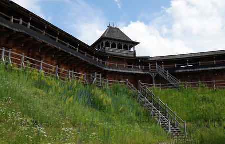 Kiev, Ukraine June 19, 2021: old wooden fortress - entertainment complex Kievan Rus old wooden fortress and artists doing a performance.のeditorial素材