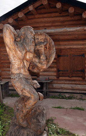 Kiev, Ukraine June 19, 2021: Figures of people and animals carved from wood - entertainment complex Kievan Rusのeditorial素材