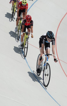 Kiev, Ukraine June 14, 2021: Sports bike track with riding cyclists