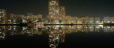 Kyiv, Ukraine March 20, 2023: View of the houses and quarters of the night city of Kyiv with...