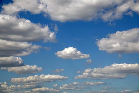 Sky with cumulus clouds conveying volume and distance