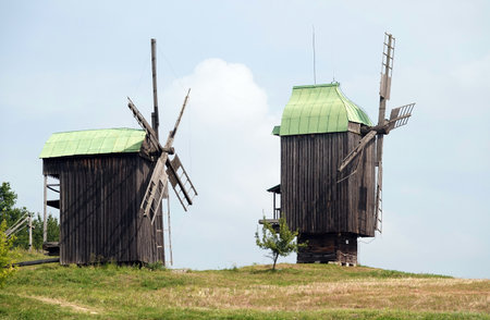 Kyiv, Ukraine, September 1, 2025: Ancient mills in the open-air museum of folk architecture and everyday life of Ukraineの写真素材