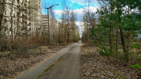 empty road in old ruined abandoned city Pripyat after nuclear disasterの写真素材