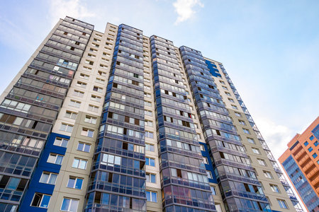 St Petersburg, Russia — July 28, 2016: New tall apartment building against the sky background