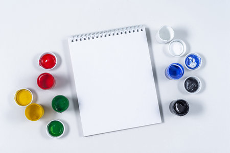Artistic mock-up on a white background with space for text. Drawing tools: colored acrylic paint,...