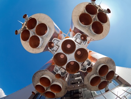 Details of space rocket engine over blue sky backgroundの写真素材