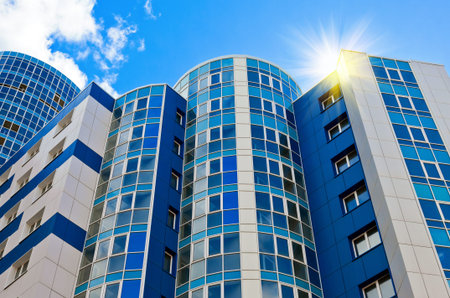 Modern skyscraper on blue sky background