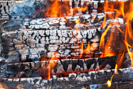 Closeup of a warm fire burning in a fireplace