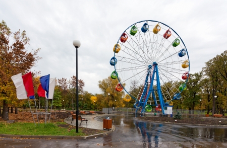 Ferris wheel in the autumn parkの写真素材