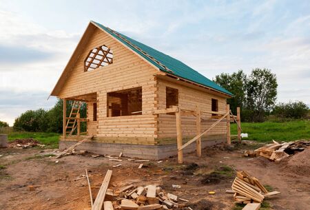 Wooden house under constructionの写真素材