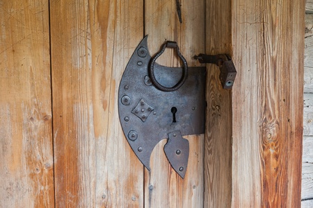 Aged grunge wooden door in russian house の写真素材