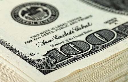 Stack of Ten Thousand Dollar Piles of One Hundred Dollar Bills. Fragmentの写真素材