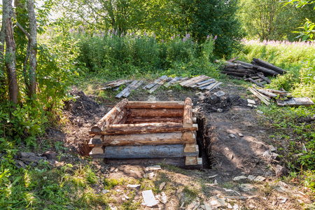 Construction of wooden water well in countrysideの写真素材