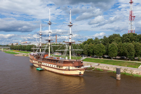 NOVGOROD, RUSSIA - AUGUST 10, 2013: Sailing ship on river Volhov in summer day. Novgorod Veliky is...