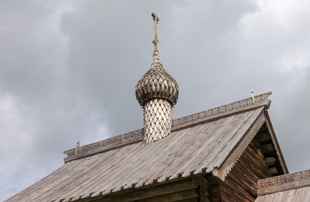 Dome of old wooden orthodox church in Russiaの写真素材