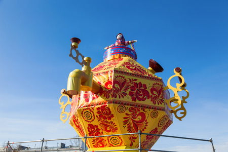 RUSSIA, SAMARA - March 2, 2014  Shrovetide in Russia  Big improvised samovar over blue sky  Maslenitsa or Pancake Week is the Slavic Holiday that dates back to the pagan timesのeditorial素材