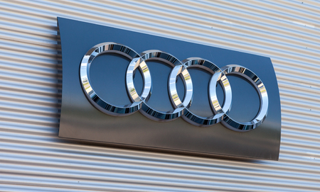 SAMARA, RUSSIA - MAY 24, 2014: The emblem Audi on the office of official dealer. Audi AG is a German automobile manufacturer.のeditorial素材