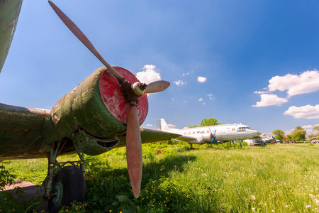SAMARA, RUSSIA - MAY 25, 2014: Old russian turboprop aircraft at an abandoned aerodrome in summertimeのeditorial素材
