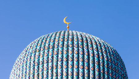 Dome of the mosque against blue sky in St. Petersburg, Russia
