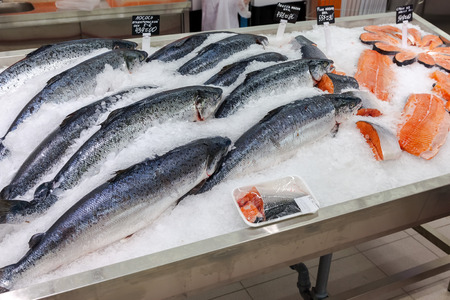 Raw fish in ice ready for sale at the supermarket Magnit. Russia's largest retailer.の写真素材