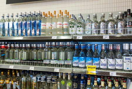 BOROVICHI, RUSSIA - JULY 11, 2014: Showcase alcoholic beverages at the grocery store in small Russian townのeditorial素材