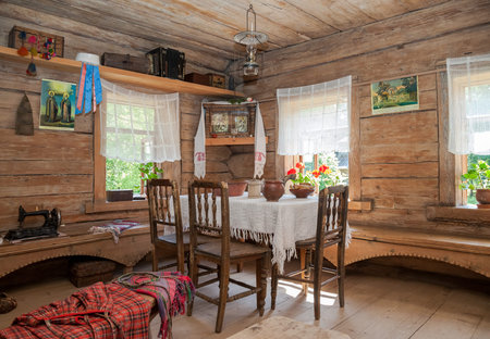 NOVGOROD, RUSSIA - JULY 23, 2014: Interior of old rural wooden house in the museum of wooden architecture Vitoslavlitsy. Wooden buildings dating from the 14th to the 19th century in museumのeditorial素材