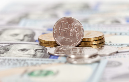 Russian rubles coins and dollars banknotes close upの写真素材