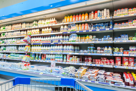 SAMARA, RUSSIA - FEBRUARY 7, 2015: Fresh milk produces ready for sale in Perekrestok Samara Store. Perekrestok is a Russian supermarket chain operated by X5 Retail Groupのeditorial素材