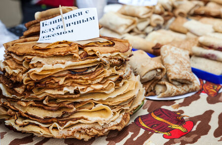 SAMARA, RUSSIA - FEBRUARY 22, 2015: Shrovetide in Russia. Appetizing fried pancakes ready for sale during Pancake Weekの写真素材