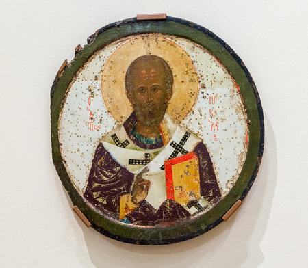 VELIKY  NOVGOROD, RUSSIA - JULY 24, 2014: Antique Russian orthodox icon of Saint Nicolas painted on wooden boardのeditorial素材