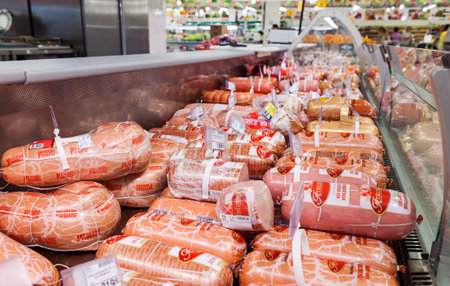 SAMARA, RUSSIA - MAY 31, 2015: Sale of sausage products in the hypermarket networkのeditorial素材
