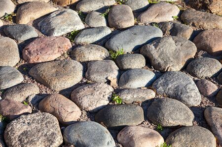 Old paved roadway as background closeupの写真素材