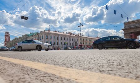 ST.PETERSBURG, RUSSIA - AUGUST 5, 2015: Road transport is moving along Nevsky Prospect in the summer sunny dayのeditorial素材