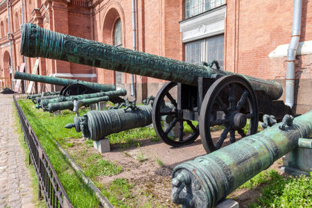 ST.PETERSBURG, RUSSIA - AUGUST 8, 2015: Ancient bronze cannons in Museum of Artillery in summer sunny dayのeditorial素材