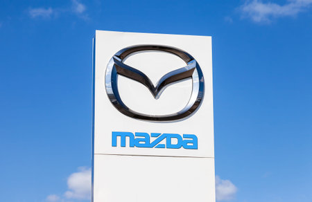 SAMARA, RUSSIA - MAY 11, 2015: Official dealership sign of Mazda. Mazda Motor Corporation is a...
