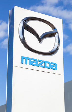 SAMARA, RUSSIA - MAY 11, 2015: Official dealership sign of Mazda. Mazda Motor Corporation is a Japanese automakerのeditorial素材