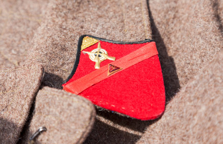 SAMARA, RUSSIA - JUNE 12, 2015: Distinctive sign on an old greatcoat of russian red armyのeditorial素材