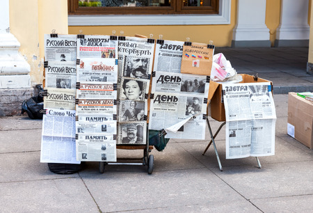 ST.PETERSBURG, RUSSIA - AUGUST 5, 2015: Sale Russian newspapers on Nevsky Prospekt in summer dayのeditorial素材