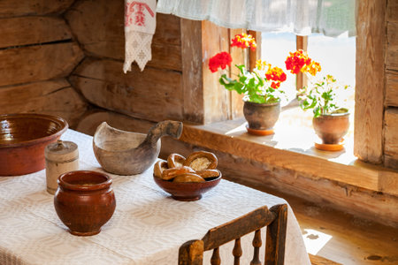 VELIKY NOVGOROD - JULY 23, 2014: Interior of old rural wooden house in the museum of wooden...