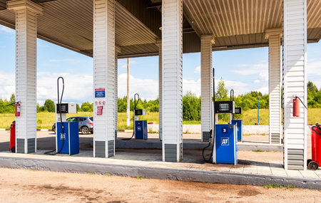 BOROVICHI, RUSSIA - JULY 18, 2015: Filling the column with different fuels at the gas station Surgutneftegas. Surgutneftegas is one of the russian oil companiesのeditorial素材