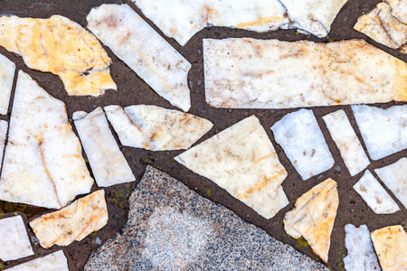 Fragment of a grey stone wall as background