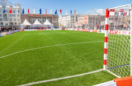 SAMARA, RUSSIA - APRIL 24, 2016: White lines marking on green grass on the soccer or football field. Open sport festival on the central square in Samara, Russiaのeditorial素材