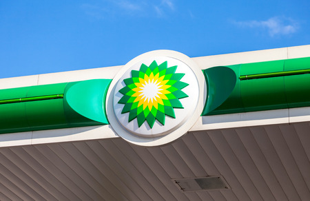 NOVGOROD REGION, RUSSIA - JULY 31, 2016: BP - British Petroleum petrol station logo against blue sky. British Petroleum is a British multinational oil and gas companyのeditorial素材