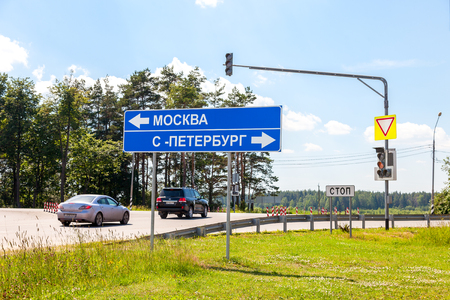 TVER REGION, RUSSIA - JUNE 26, 2016: Exit to the highway Moskva - St. Petersburg. Traffic signs and Traffic lightのeditorial素材