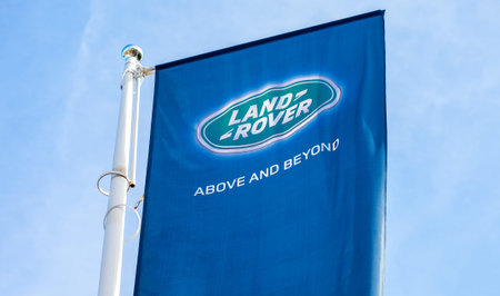 SAMARA, RUSSIA - AUGUST 27, 2016: Official dealership flags of Land Rover against the blue sky...
