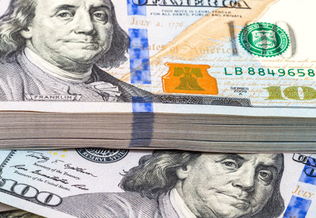 Stack of ten thousand american dollars close up. Fragment