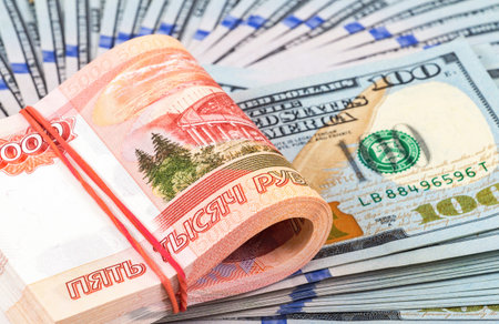 Folded five thousandths banknotes of russian roubles on the american dollarsの写真素材