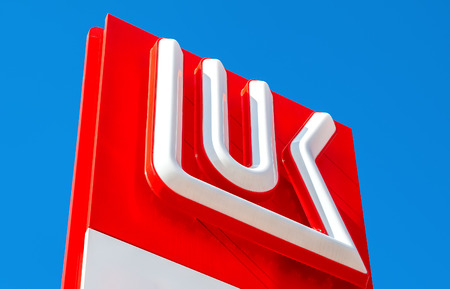 MOSCOW, RUSSIA - JULY 11, 2016: The emblem of the oil company Lukoil against the the blue sky. Lukoil is one of the largest russian oil companiesのeditorial素材